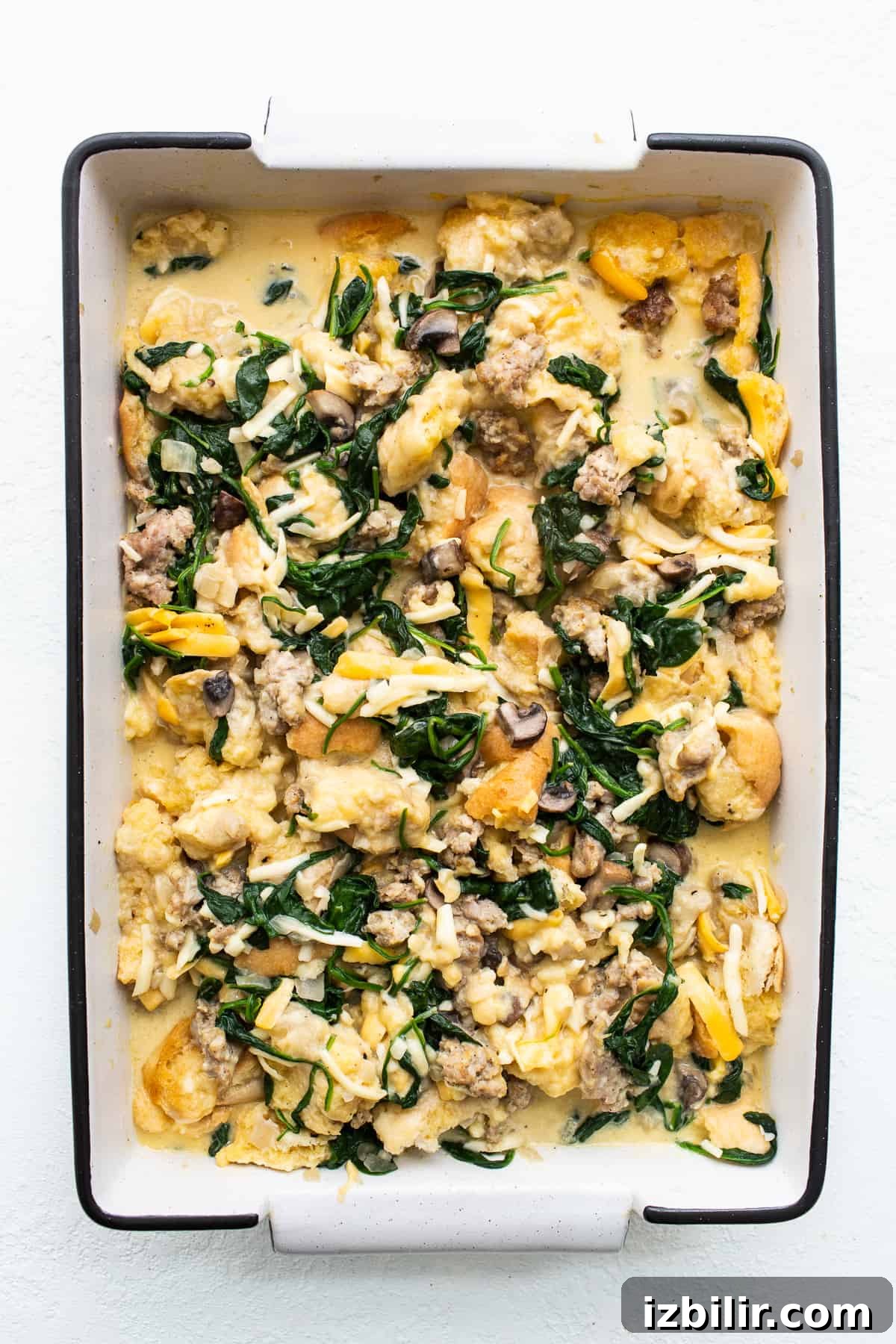 Breakfast strata after it soaked overnight in a casserole dish.