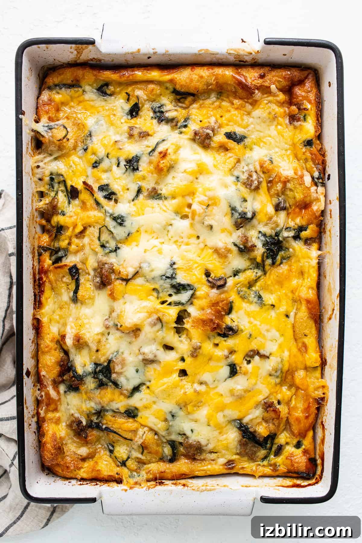 Breakfast strata baked in a casserole dish.