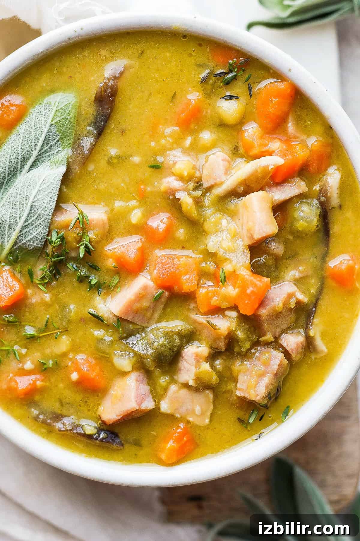 Bowl of split pea soup with ham. Bowl of split pea soup with ham.