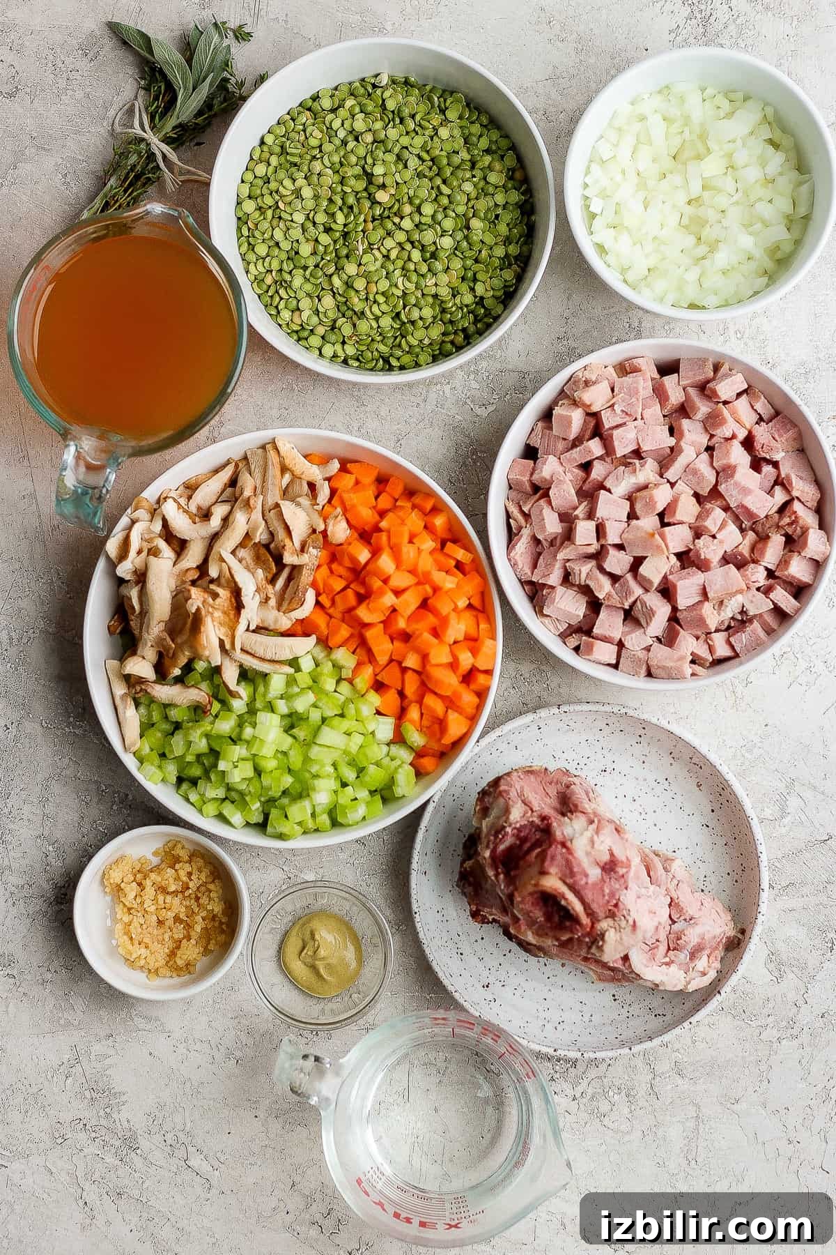 Ingredients for split pea soup with ham. Ingredients for split pea soup with ham in bowls.