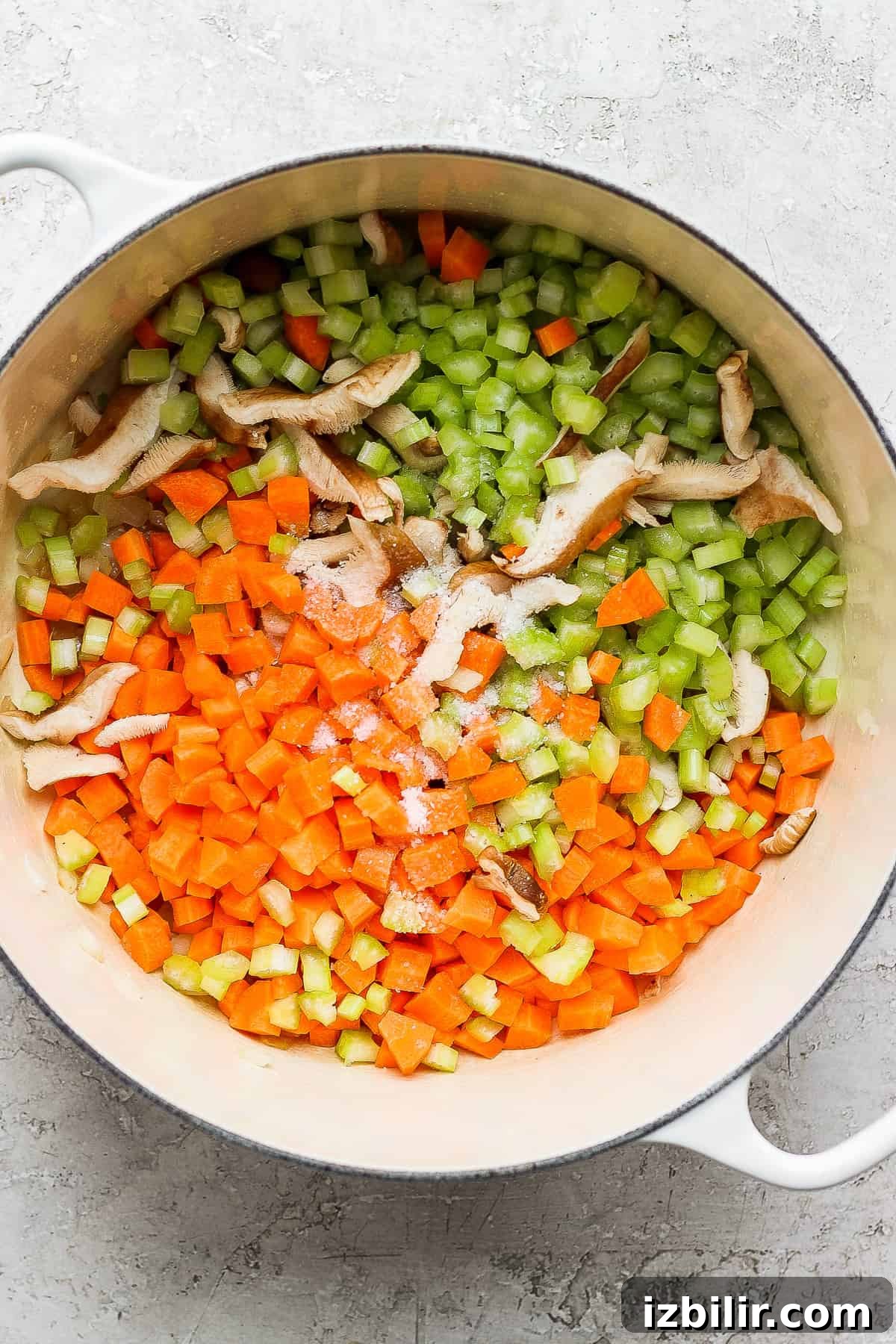 Diced veggies ready to start the soup. Diced veggies in a dutch oven.