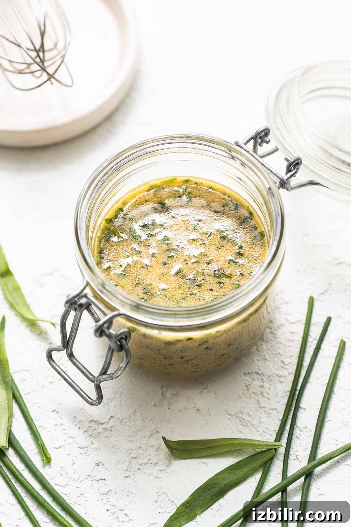 Homemade hummus dressing in a jar.