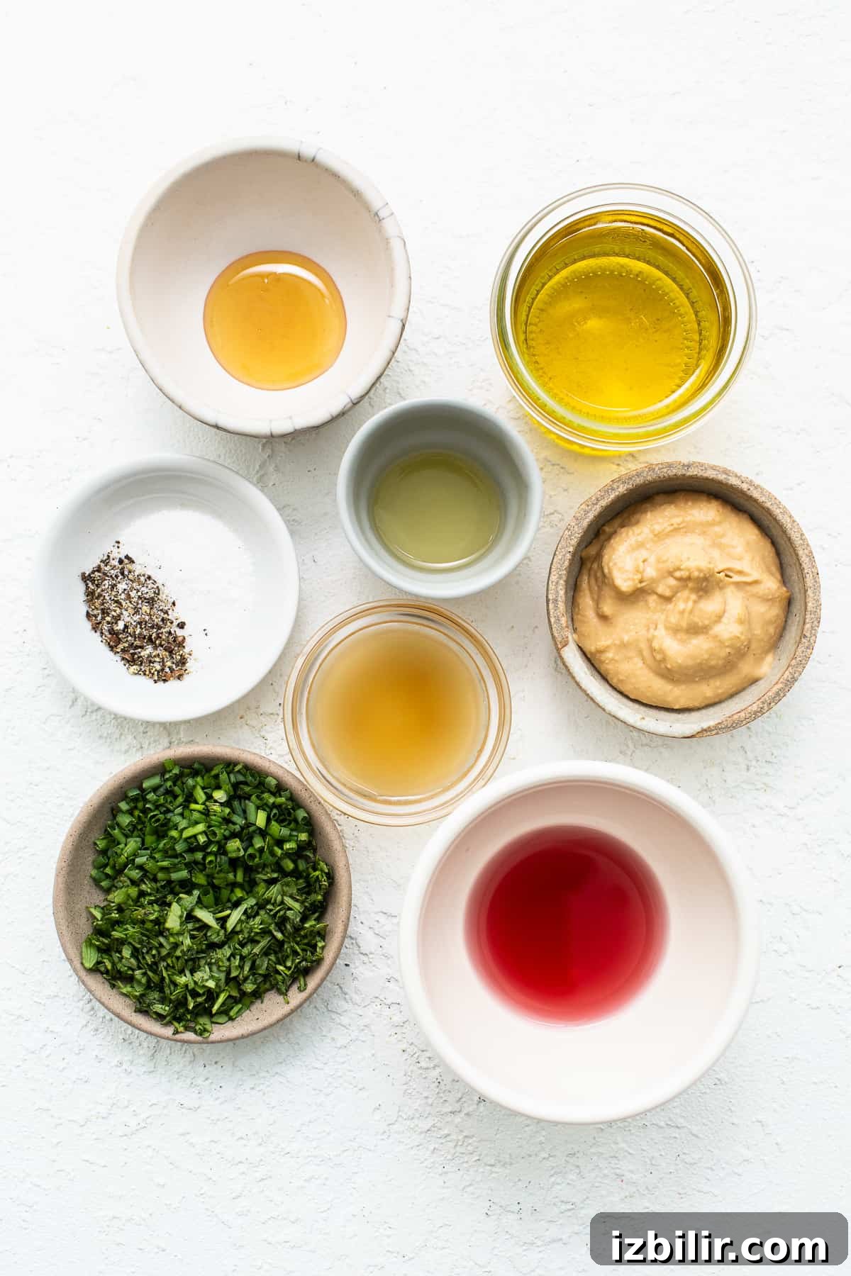 Ingredients for hummus dressing ingredients on countertop.