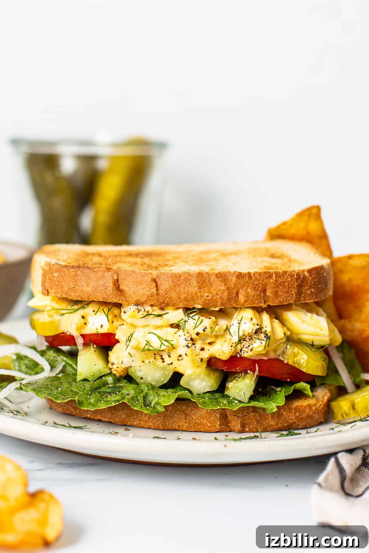 Creamy Homemade Egg Salad Sandwich 2 Egg salad sandwich on a plate.