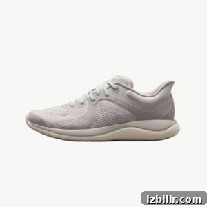 A light grey running shoe with a white sole.