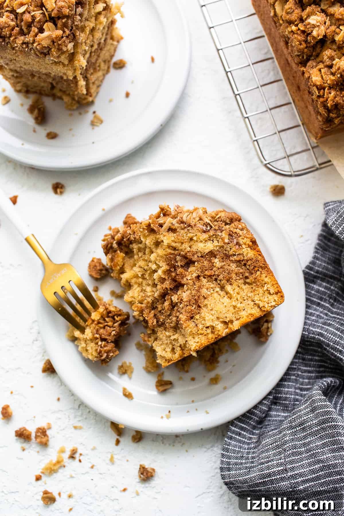 A piece of coffee cake on a plate.