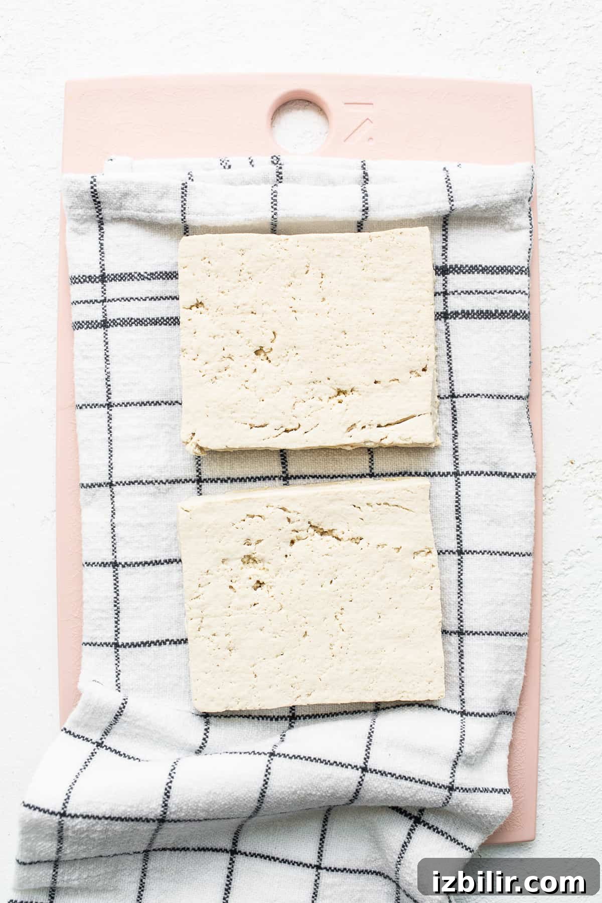 Sliced tofu Sliced tofu on cutting board