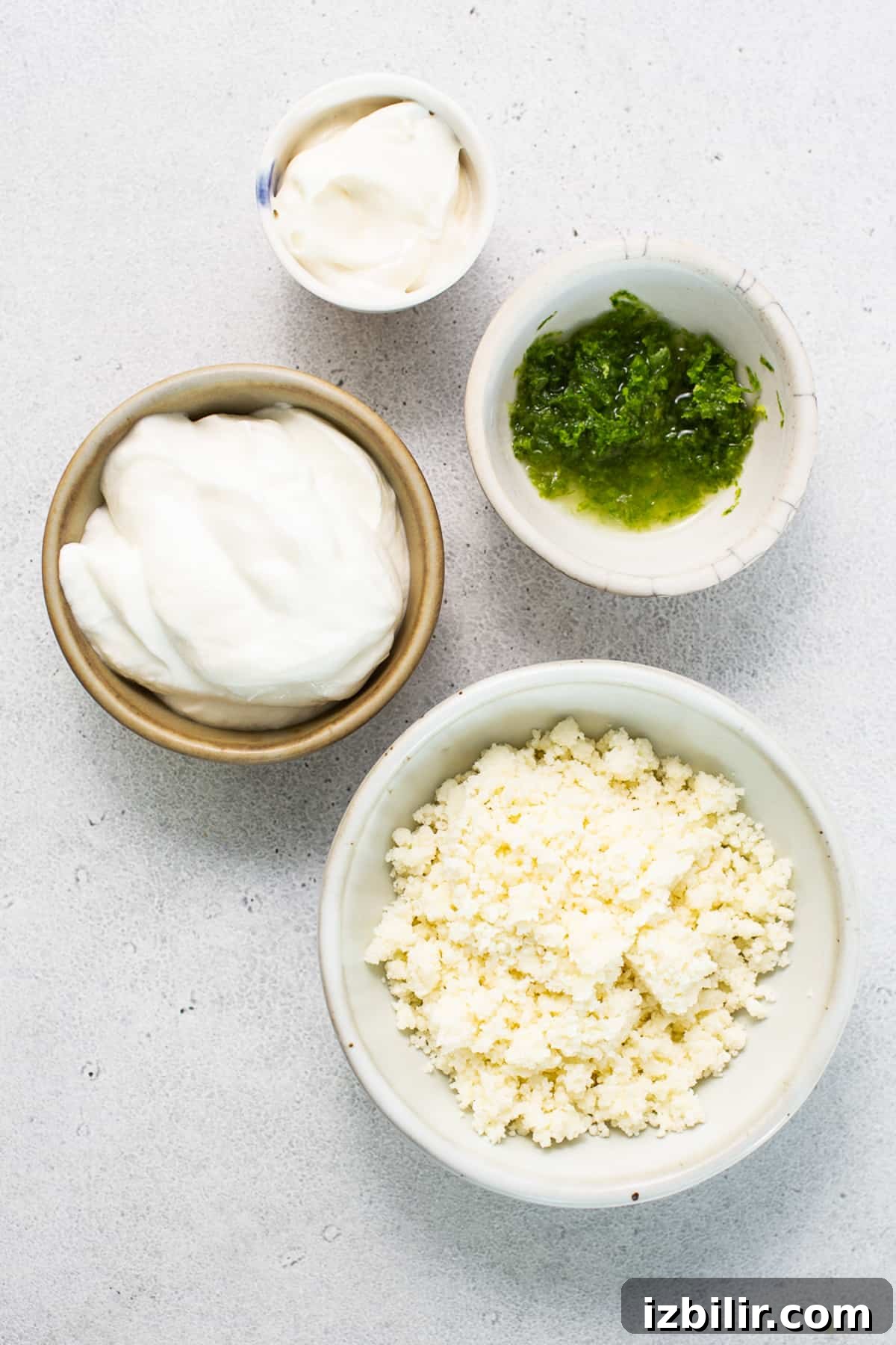 Ingredients for air fryer elote in bowls.