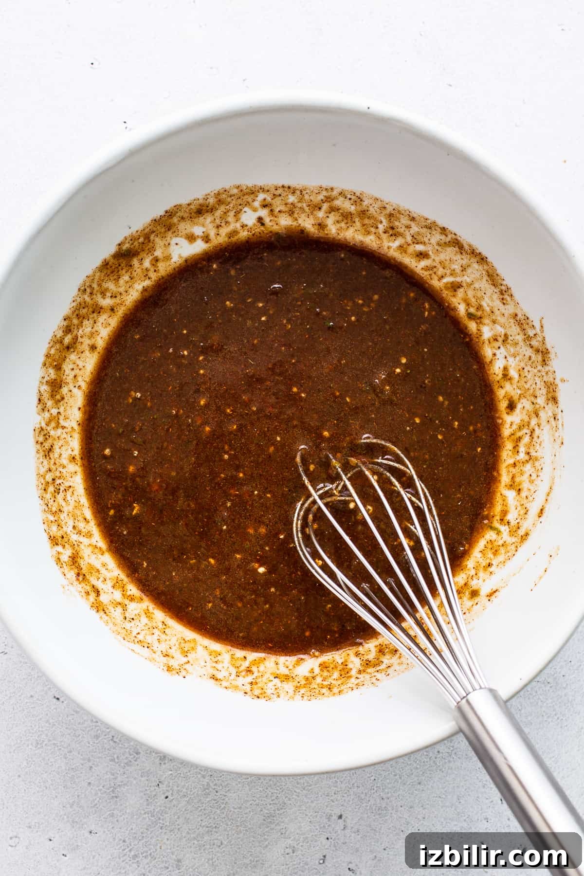 Steak fajita marinade whisked together in a bowl. Steak fajita marinade whisked together in a bowl.