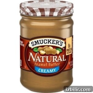 Fit Foodie Cooking Club - May 2023 Recipes and Meal Plans 3 jar of peanut butter on clear background.