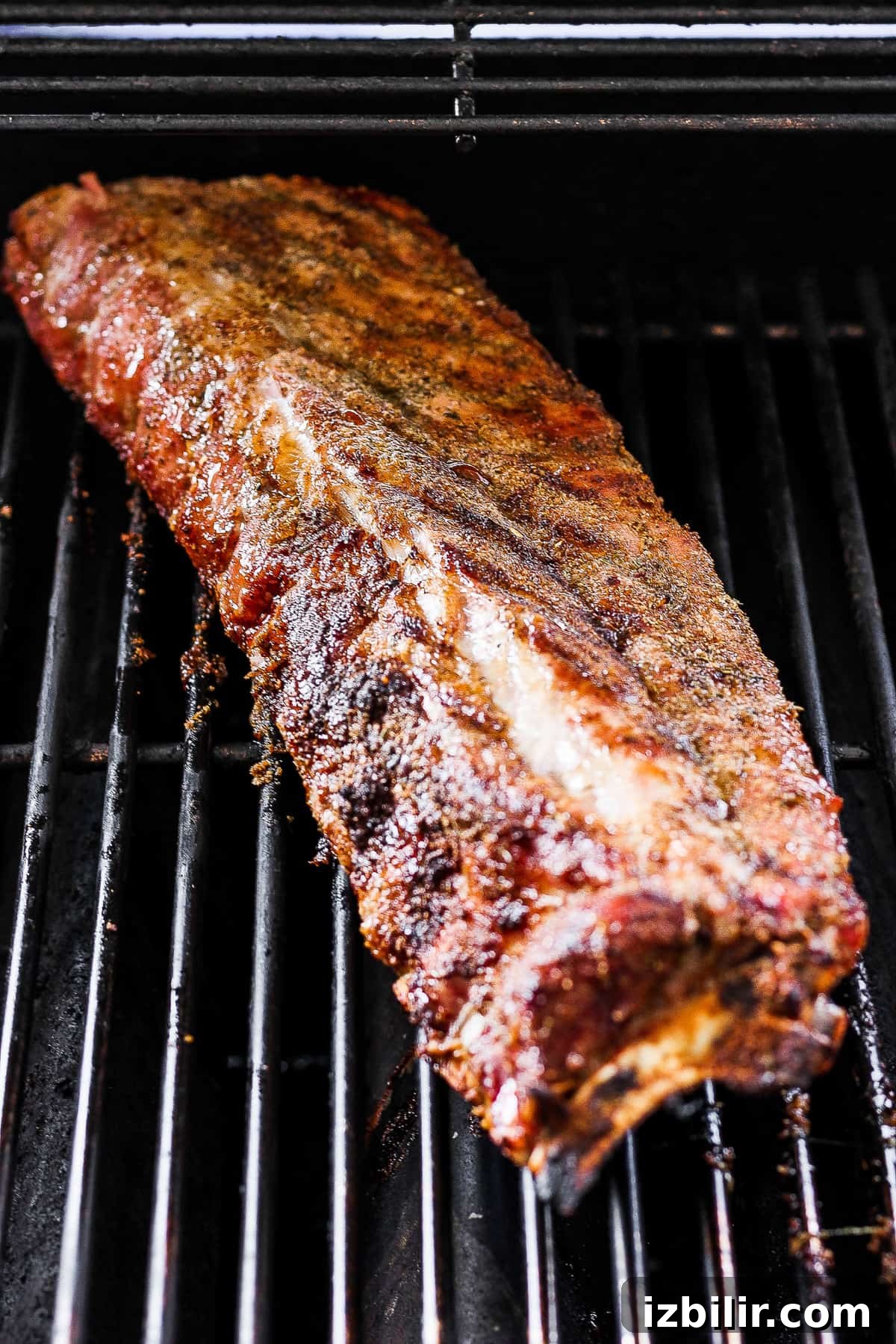 Ribs cooking on the grill Rack of ribs cooking on the grill.