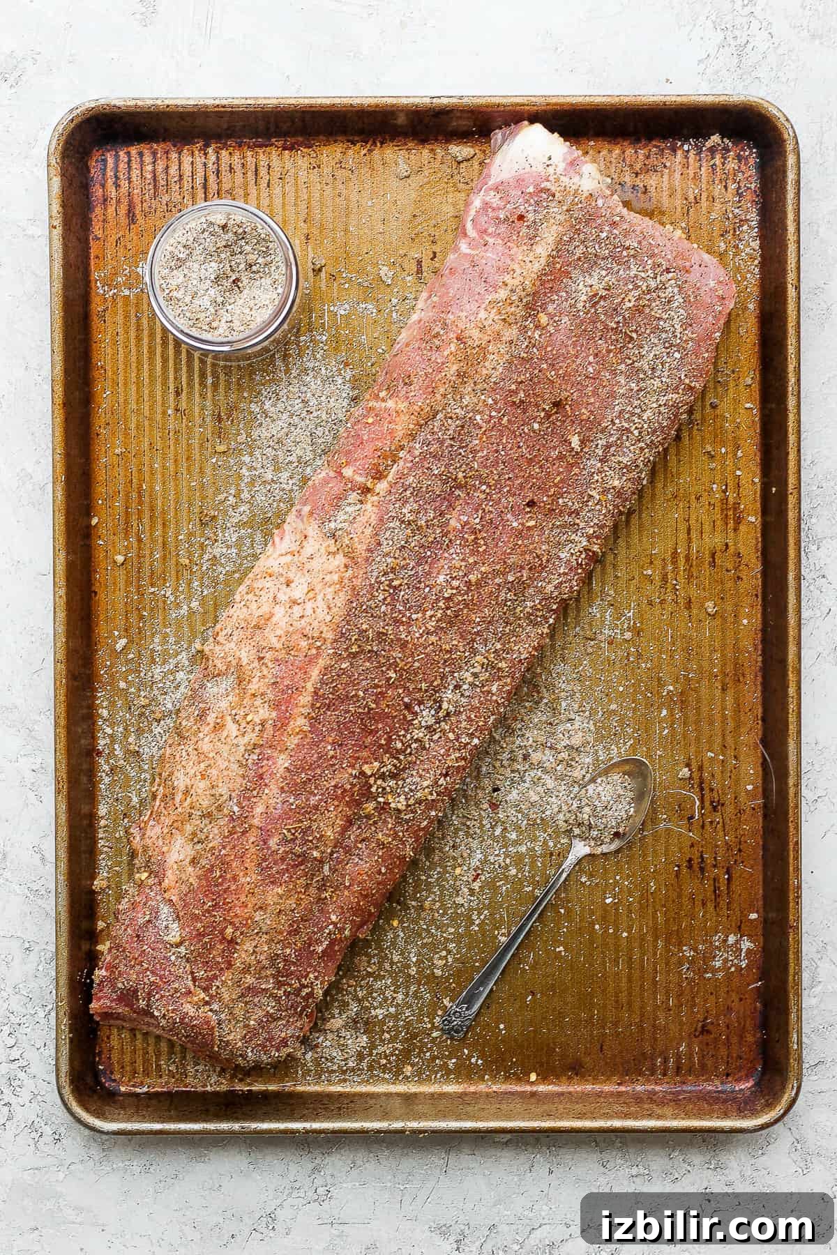 Dry rub on a rack of ribs.