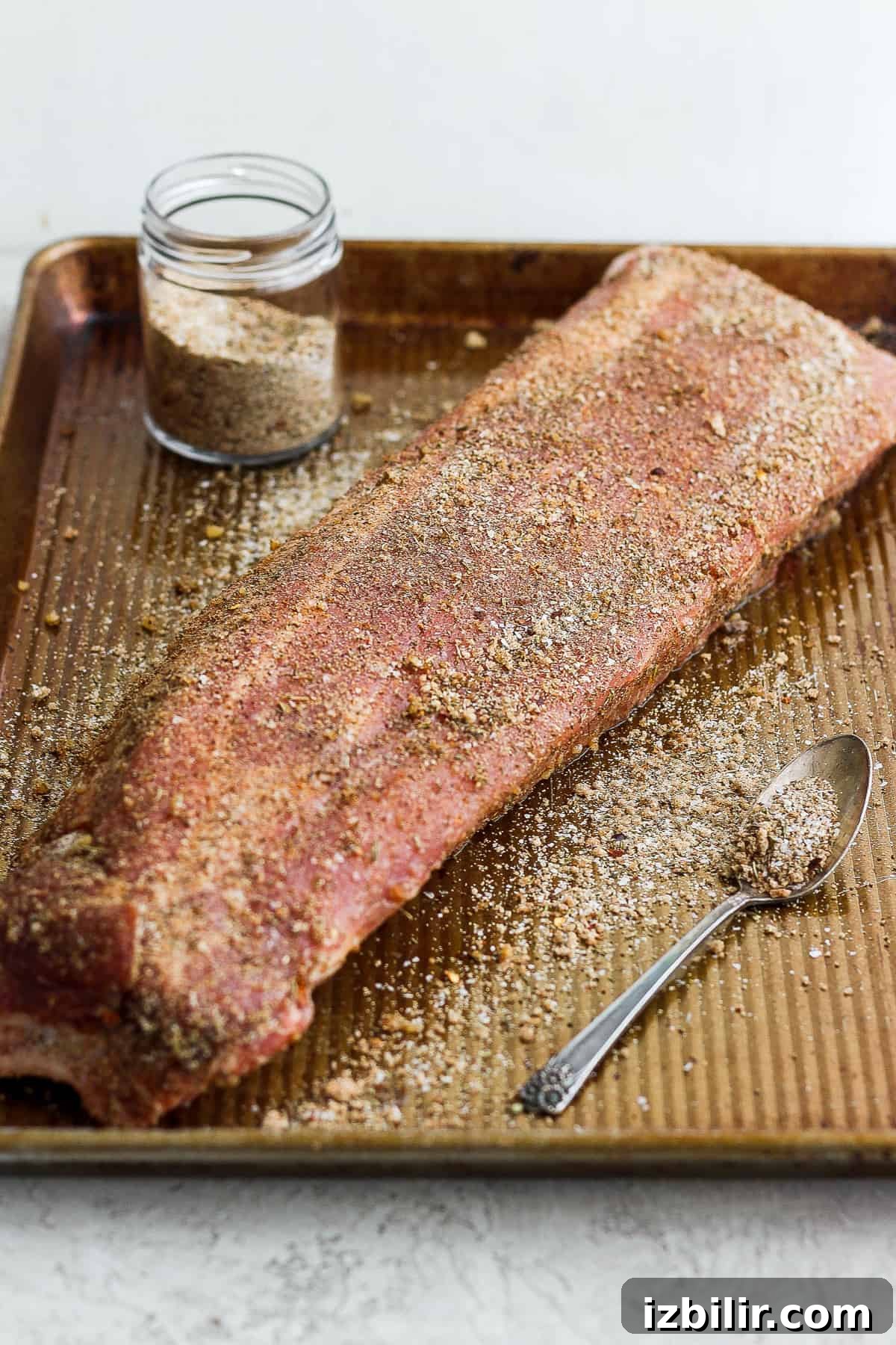 Dry rub on a rack of ribs.