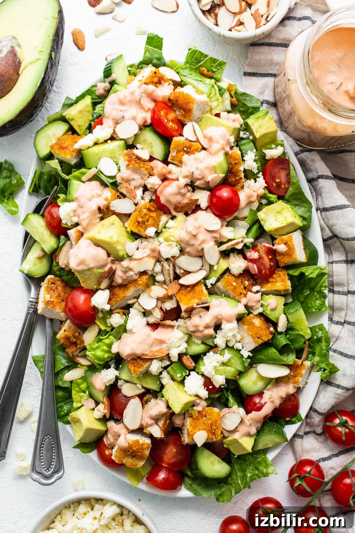 Crispy Chicken Salad with Creamy Thousand Island Dressing 2 Crispy cornflake-coated chicken on a fresh salad