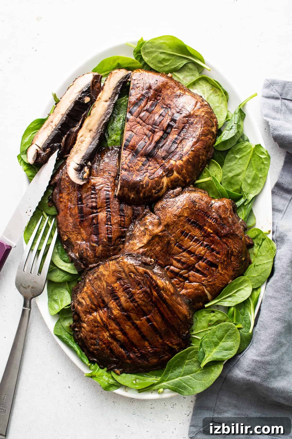 Grilled portobello mushrooms on a plate. Grilled portobello mushrooms on a plate.