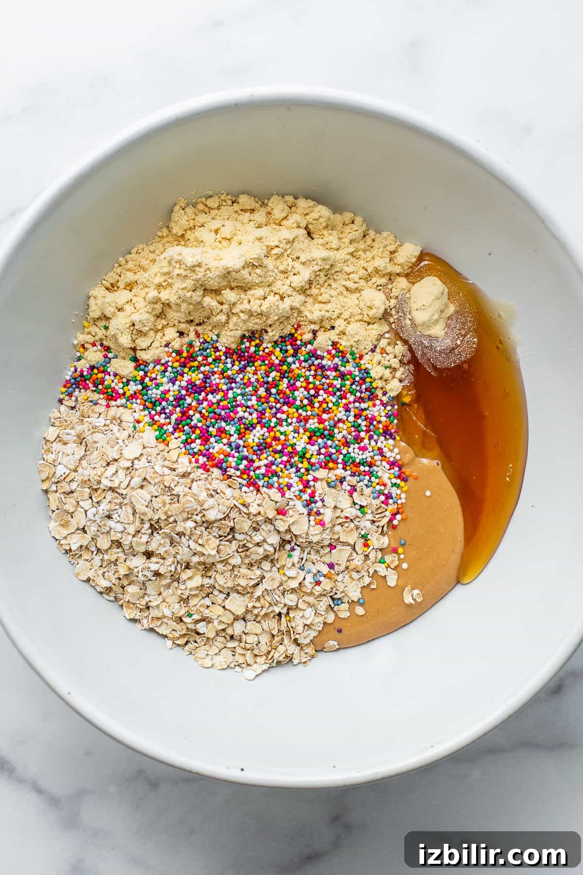 High-Protein Cake Pop Recipe 4 Protein cake pop ingredients in a bowl.
