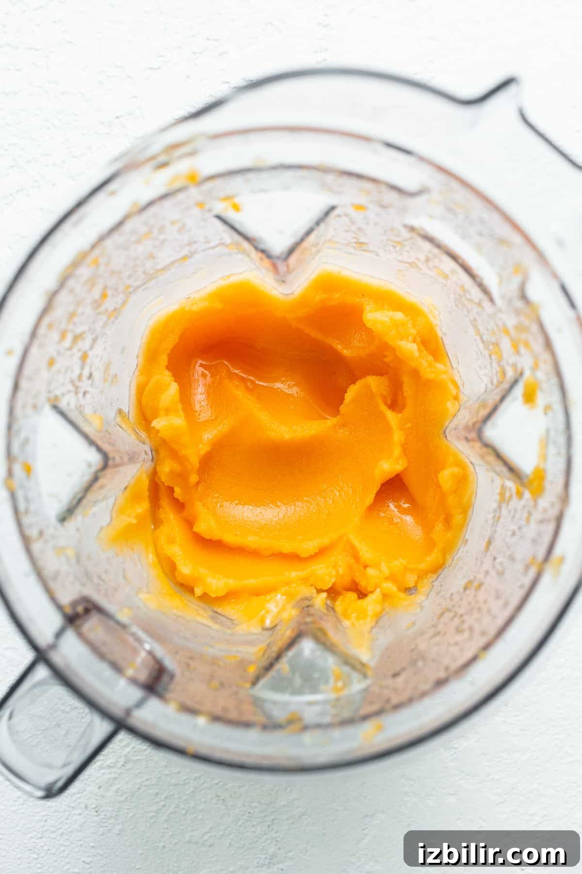 Blended Frozen Aperol Spritz Slushy in a blender blended frozen aperol spritz in blender.