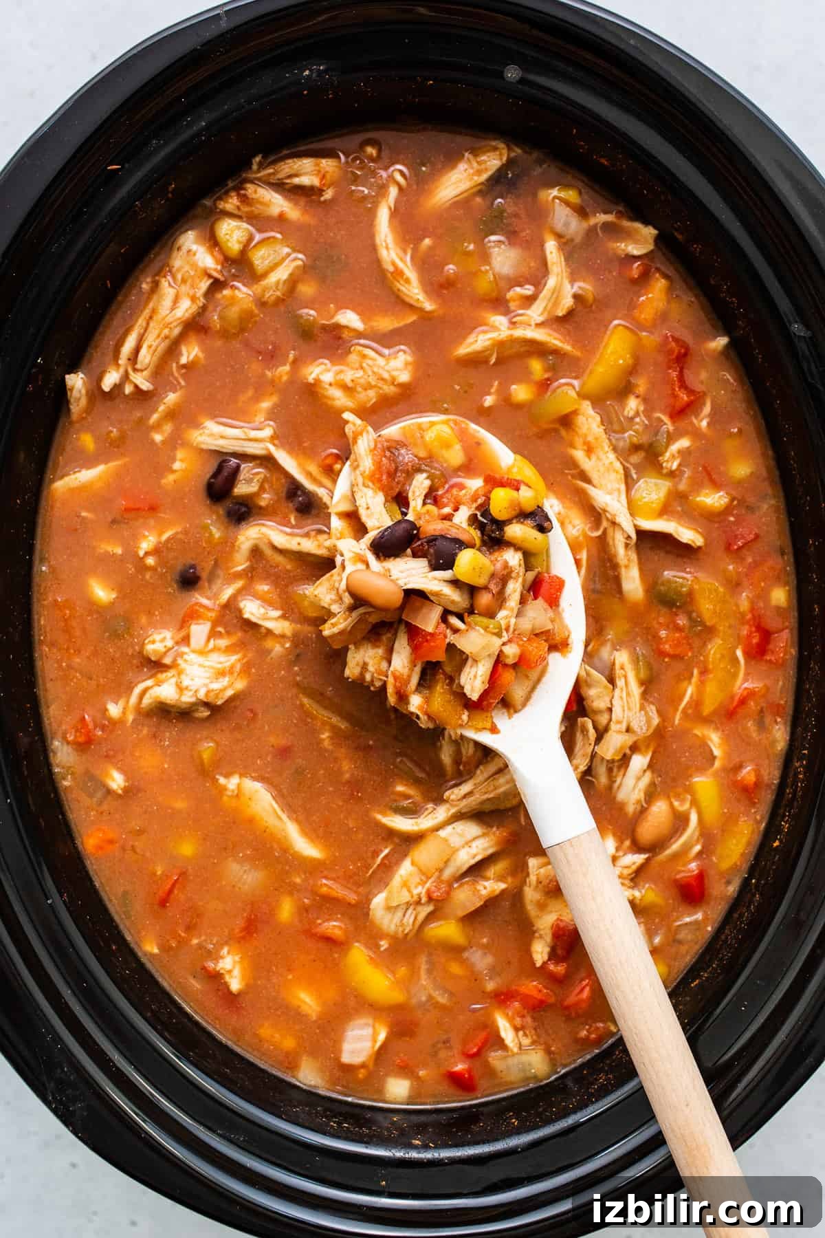 Chicken tortilla soup in a crockpot. Chicken tortilla soup in a crockpot.