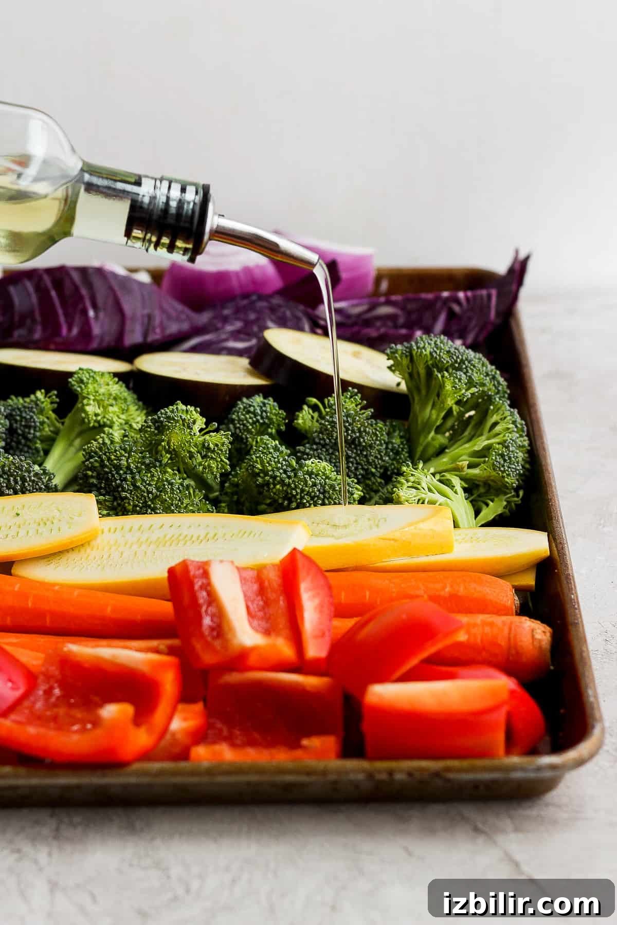 Grilled Rainbow Vegetables Recipe with Balsamic Glaze 3 A tray filled with vegetables and a bottle of wine.