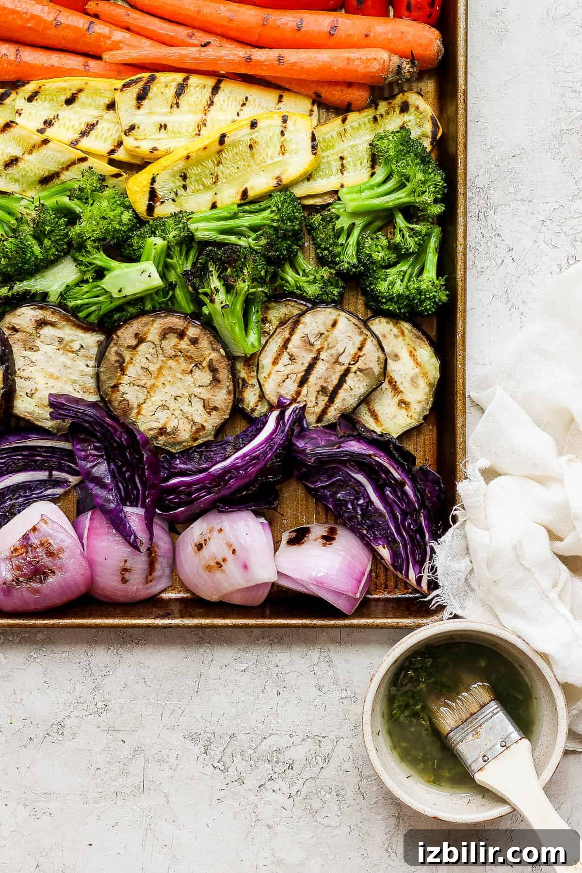 Grilled Rainbow Vegetables Recipe with Balsamic Glaze 7 A tray of grilled vegetables and a bowl of soup.