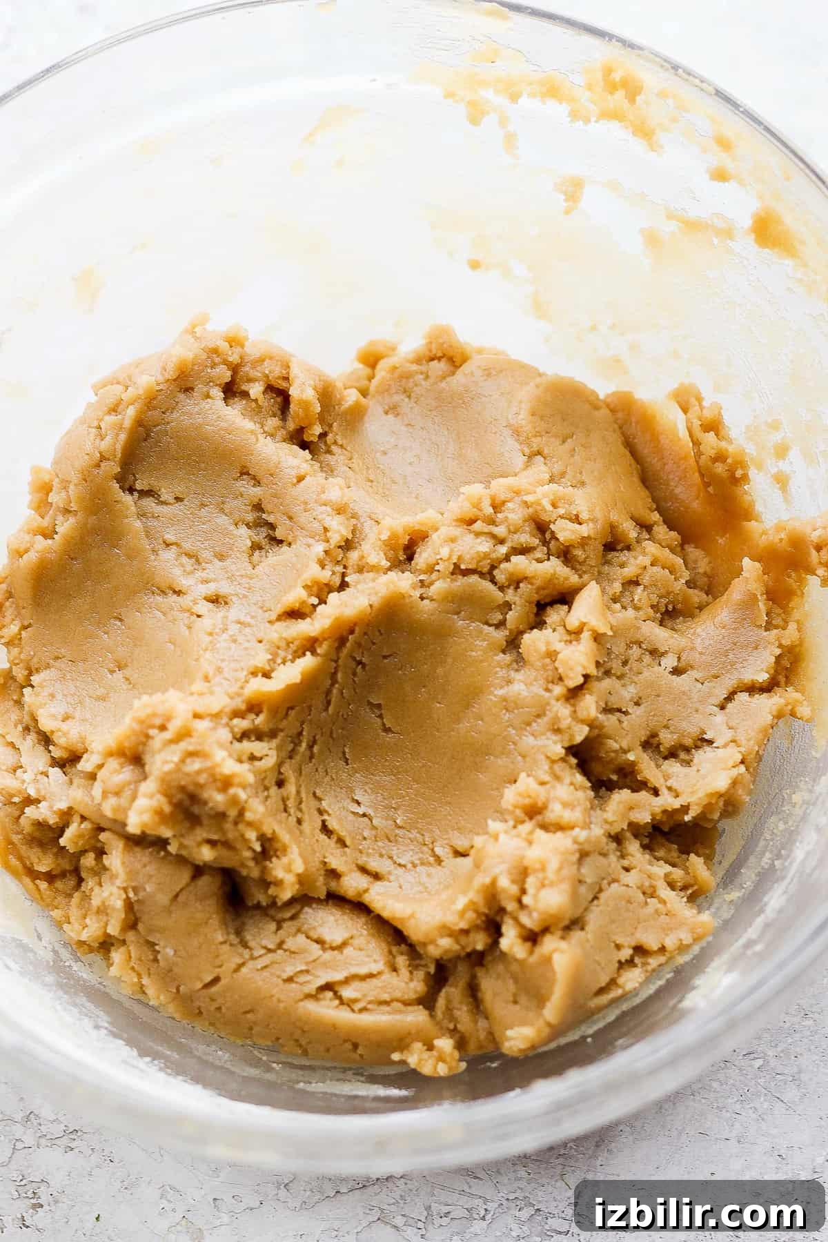 Chewy Tahini Cookies Recipe 4 peanut butter in a glass bowl.