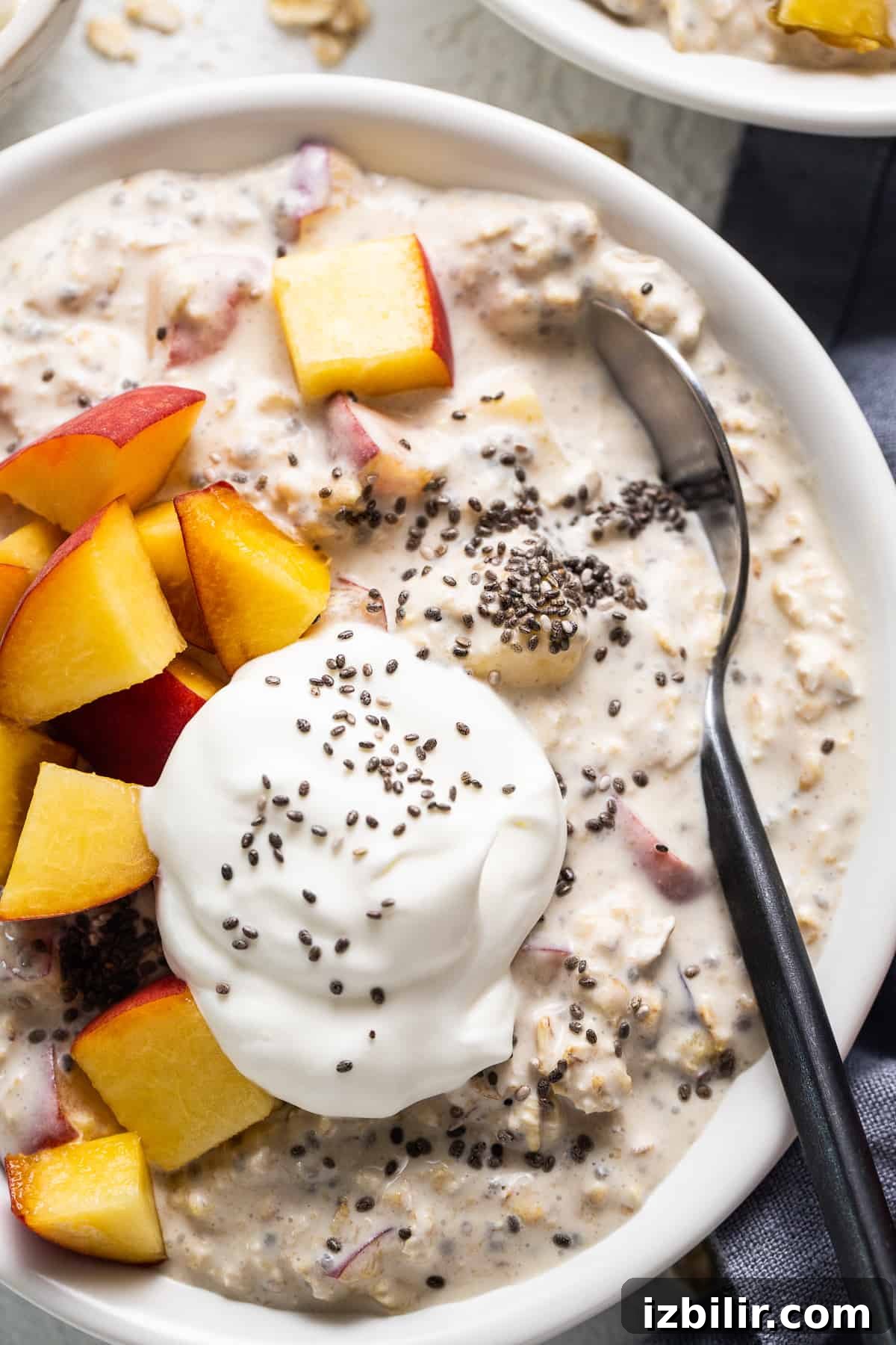 Peaches and Cream Overnight Oats Recipe 5 Peaches and cream overnight oats served in a bowl