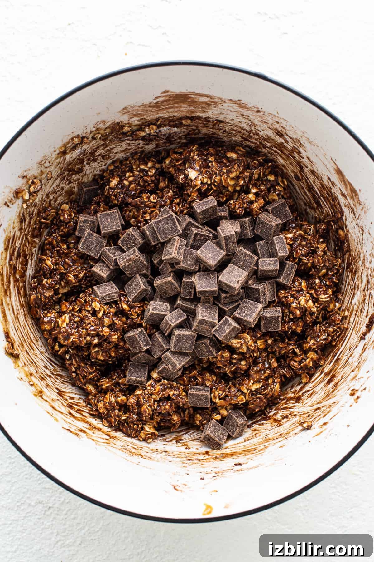 Chewy Chocolate Peanut Butter Oatmeal Cookies Recipe 3 Chocolate granola in a bowl with chocolate chips.