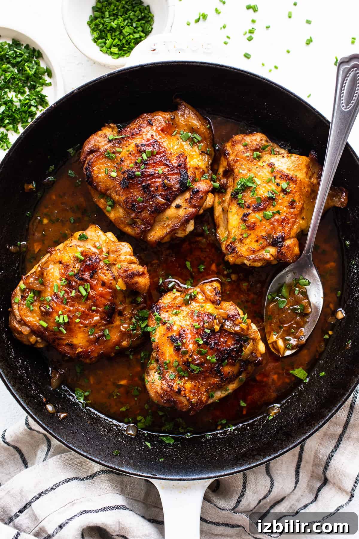 Crispy Cast-Iron Skillet Chicken Thighs 2 Cast iron chicken thighs in skillet
