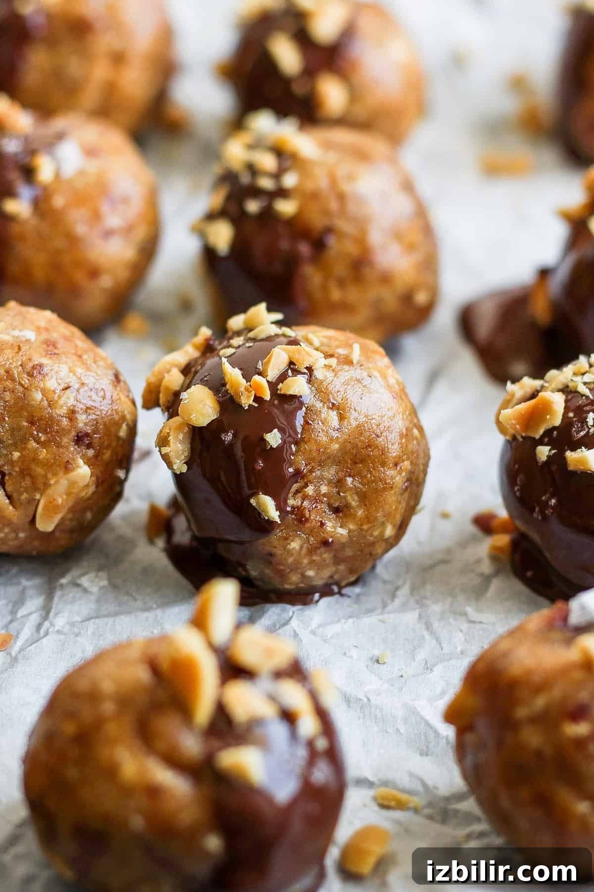 September 2023 Fit Foodie Cooking Club: Seasonal Recipes 8 peanut butter and chocolate bites on a baking sheet.