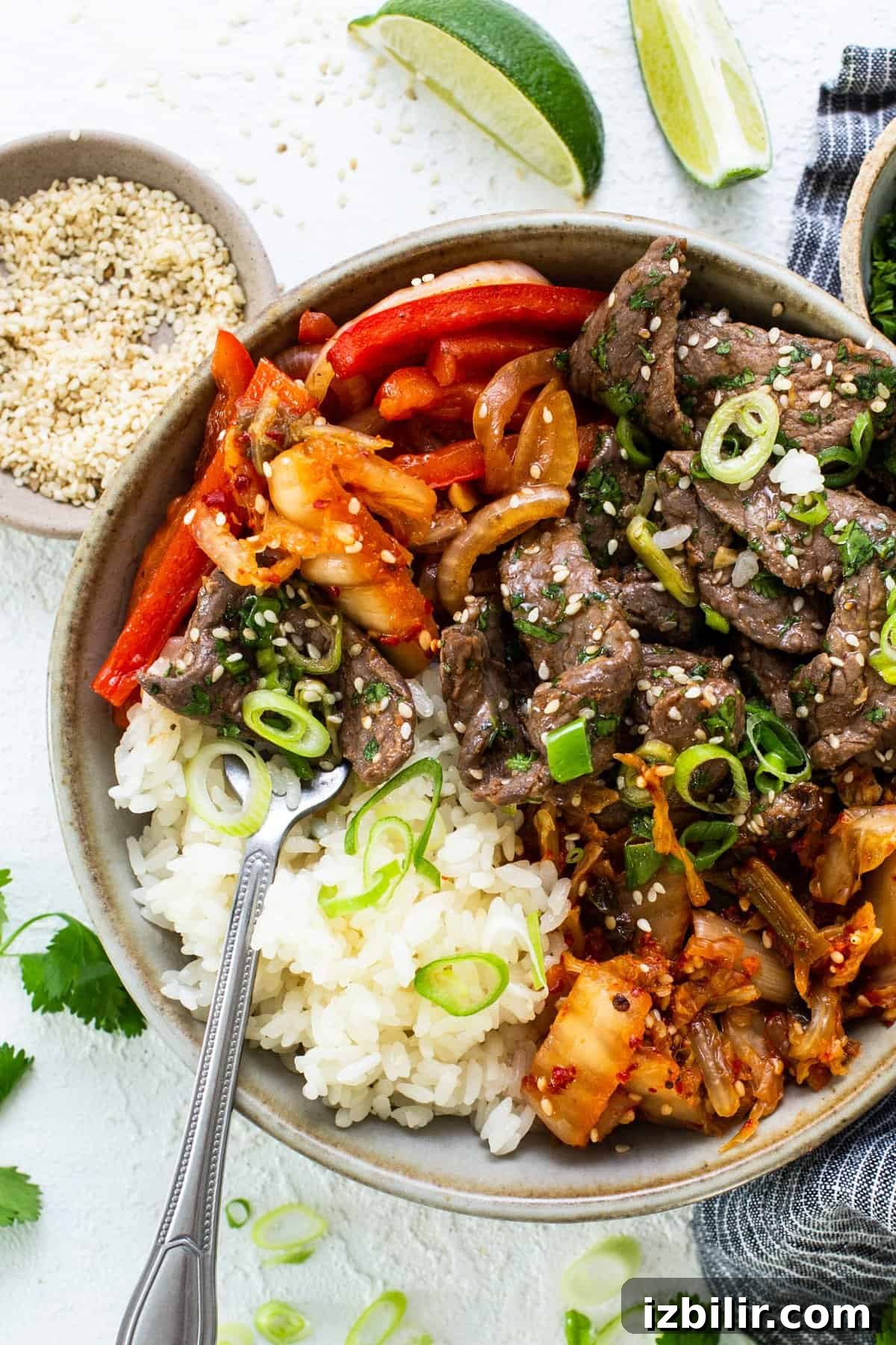 Korean Beef Bulgogi Rice Bowl Recipe 2 Korean beef bowl with rice and vegetables.