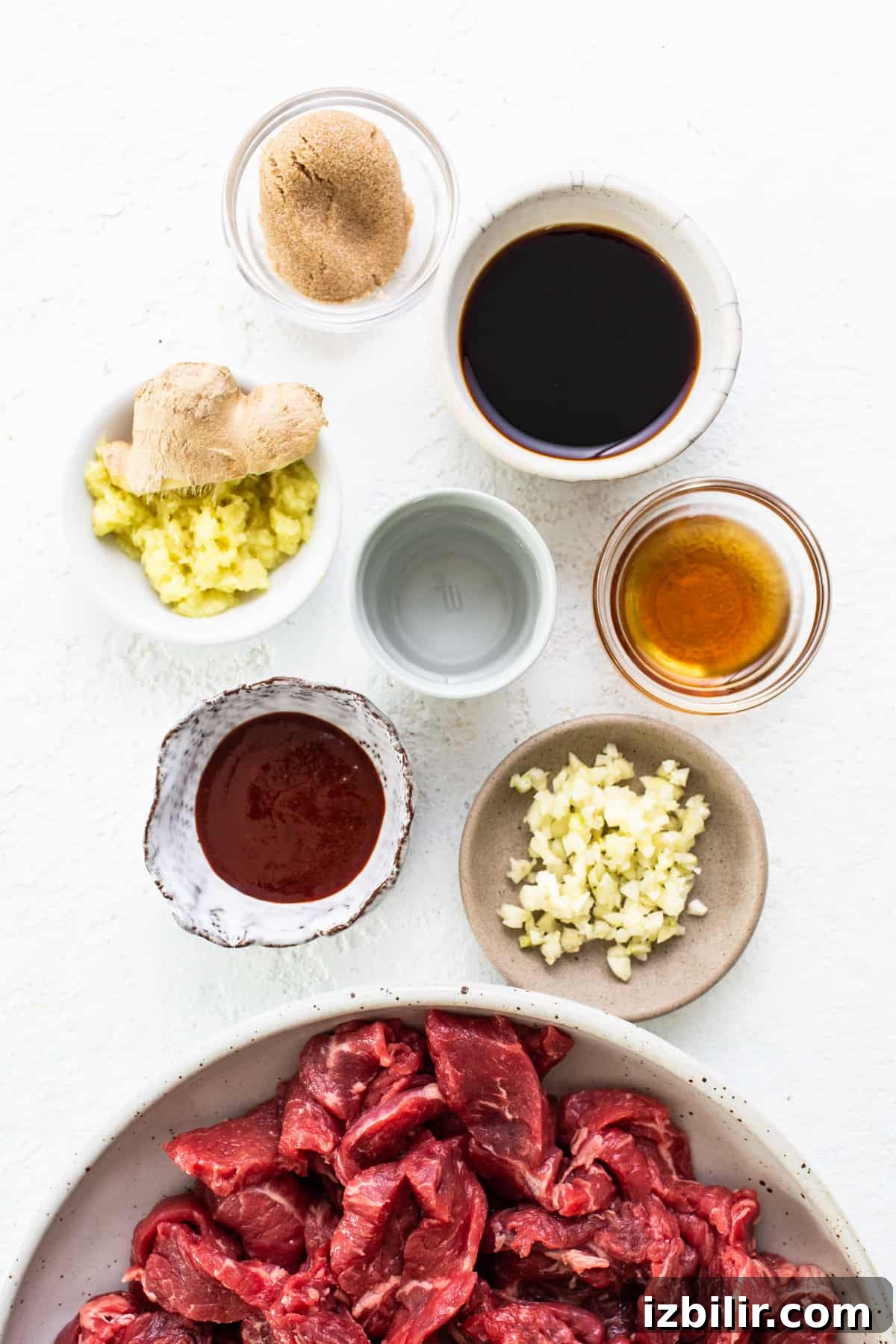 Korean Beef Bulgogi Rice Bowl Recipe 4 Ingredients for Asian beef stew on a white background.