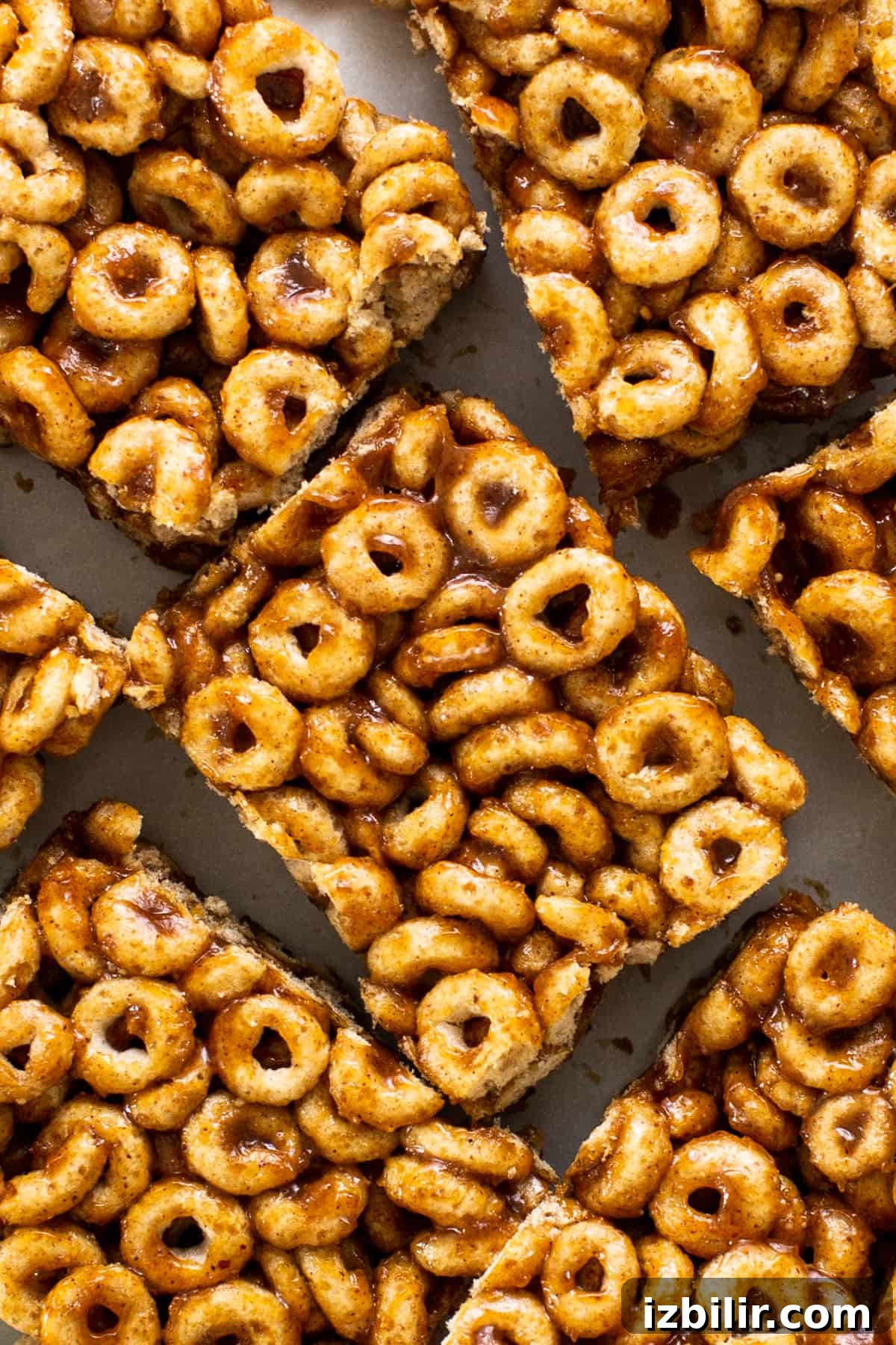 Cereal krispy bars are stacked on top of each other.