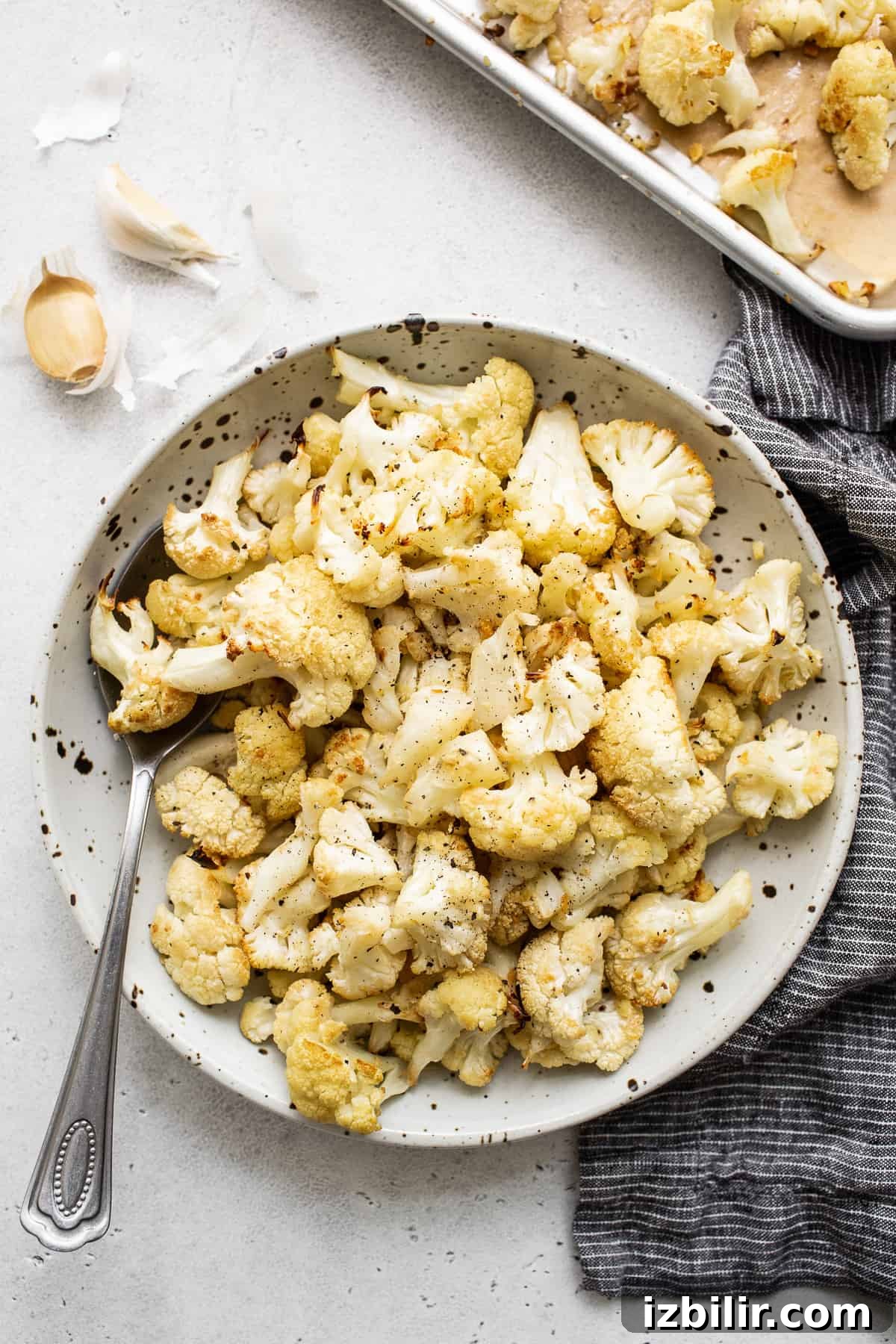 Garlic roasted cauliflower in a bowl.