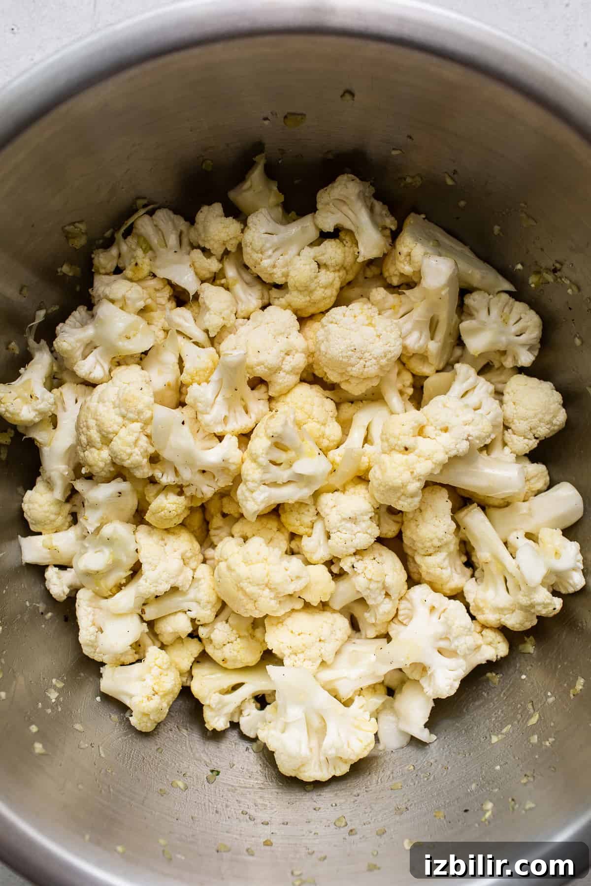 Cauliflower florets in a bowl.