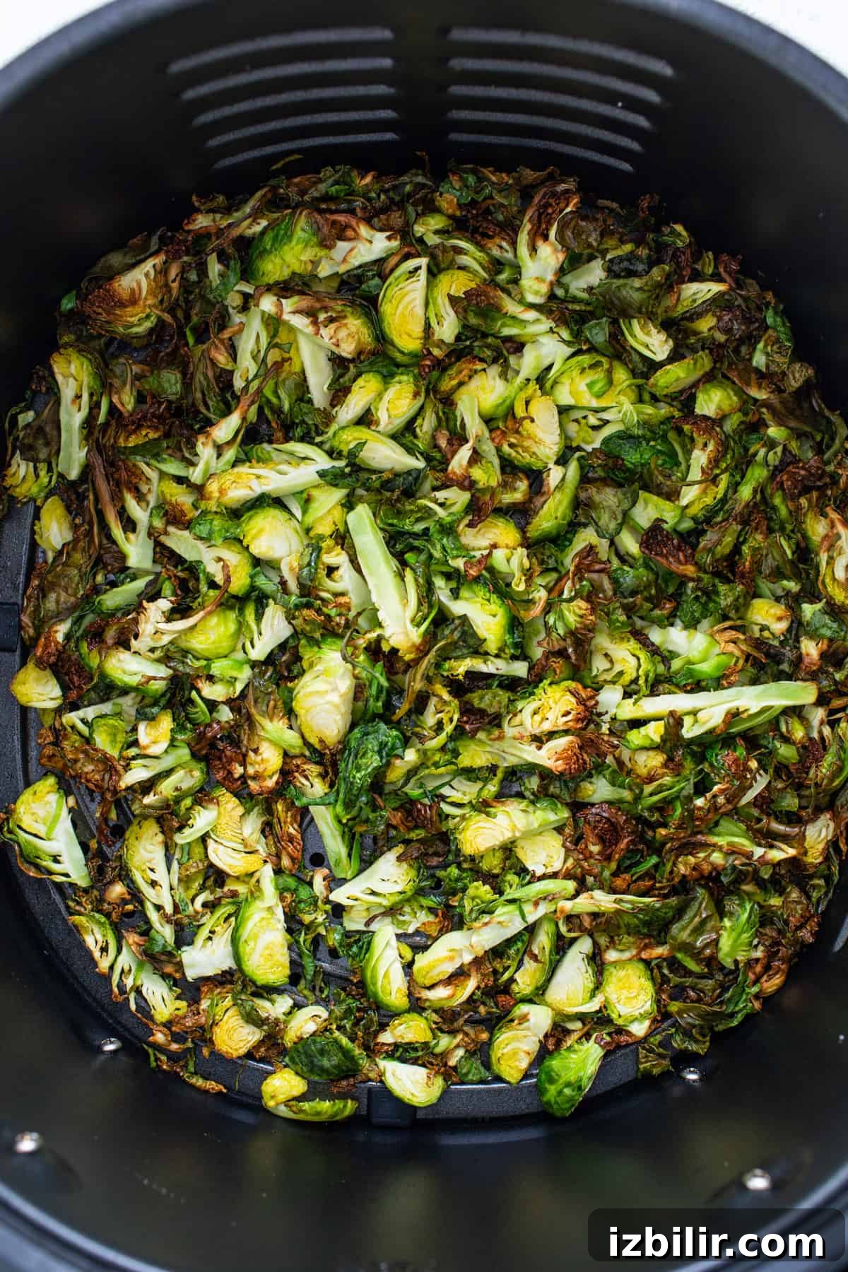 Crispy Air Fryer Brussels Sprouts Salad 5 Brussels sprouts in an air fryer.