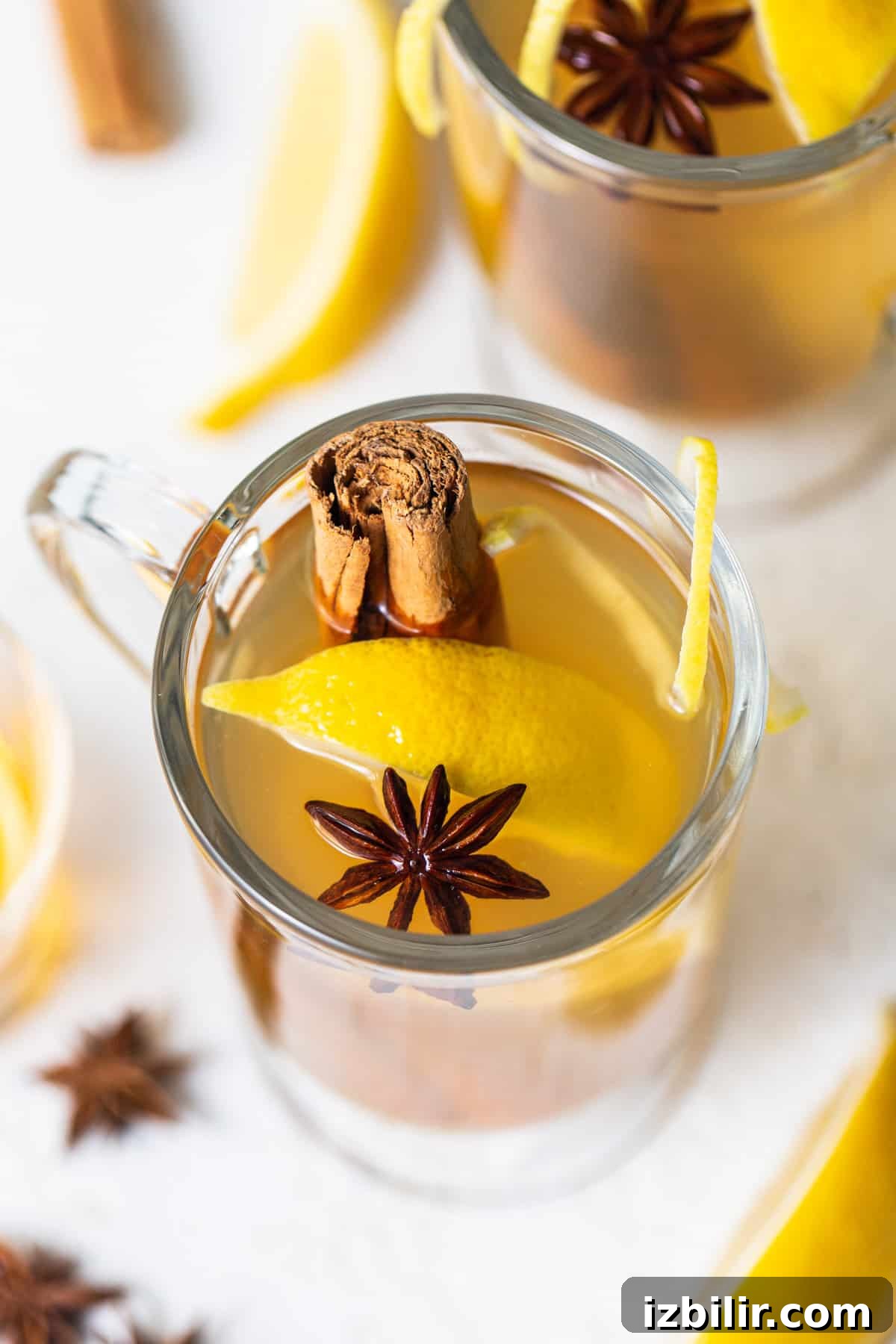 Maple Hot Toddy Recipe: Whiskey, Lemon & Warm Spices 2 A cup of mulled cider with cinnamon sticks and star anise.