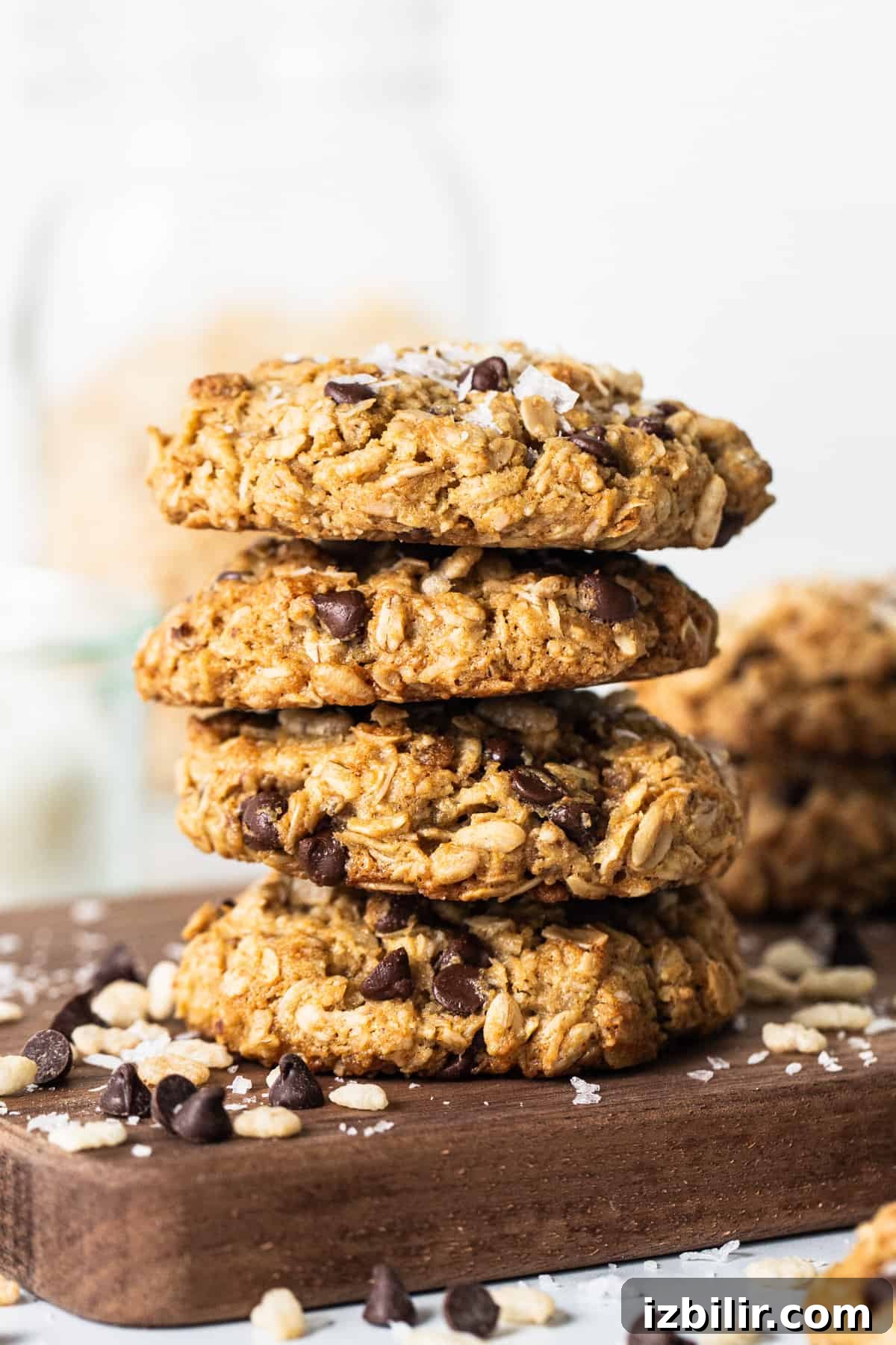 Chewy Flourless Ranger Cookies with Chocolate and Oats 2 A stack of oatmeal cookies on a cutting board.