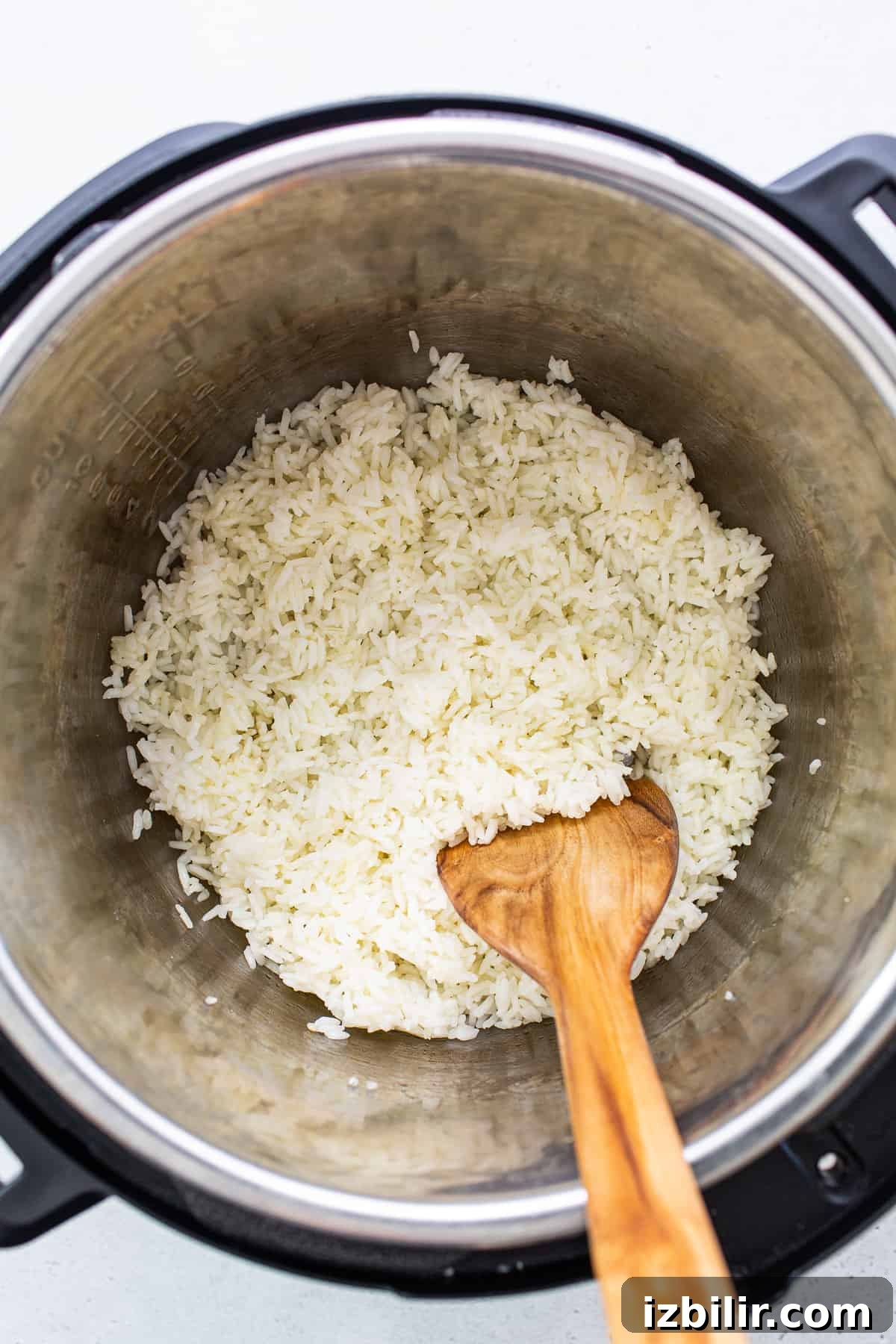 Fluffy Instant Pot White Rice in 12 Minutes 4 fluffed rice in instant pot.