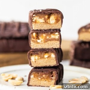 Peanut butter bars stacked on top of each other.