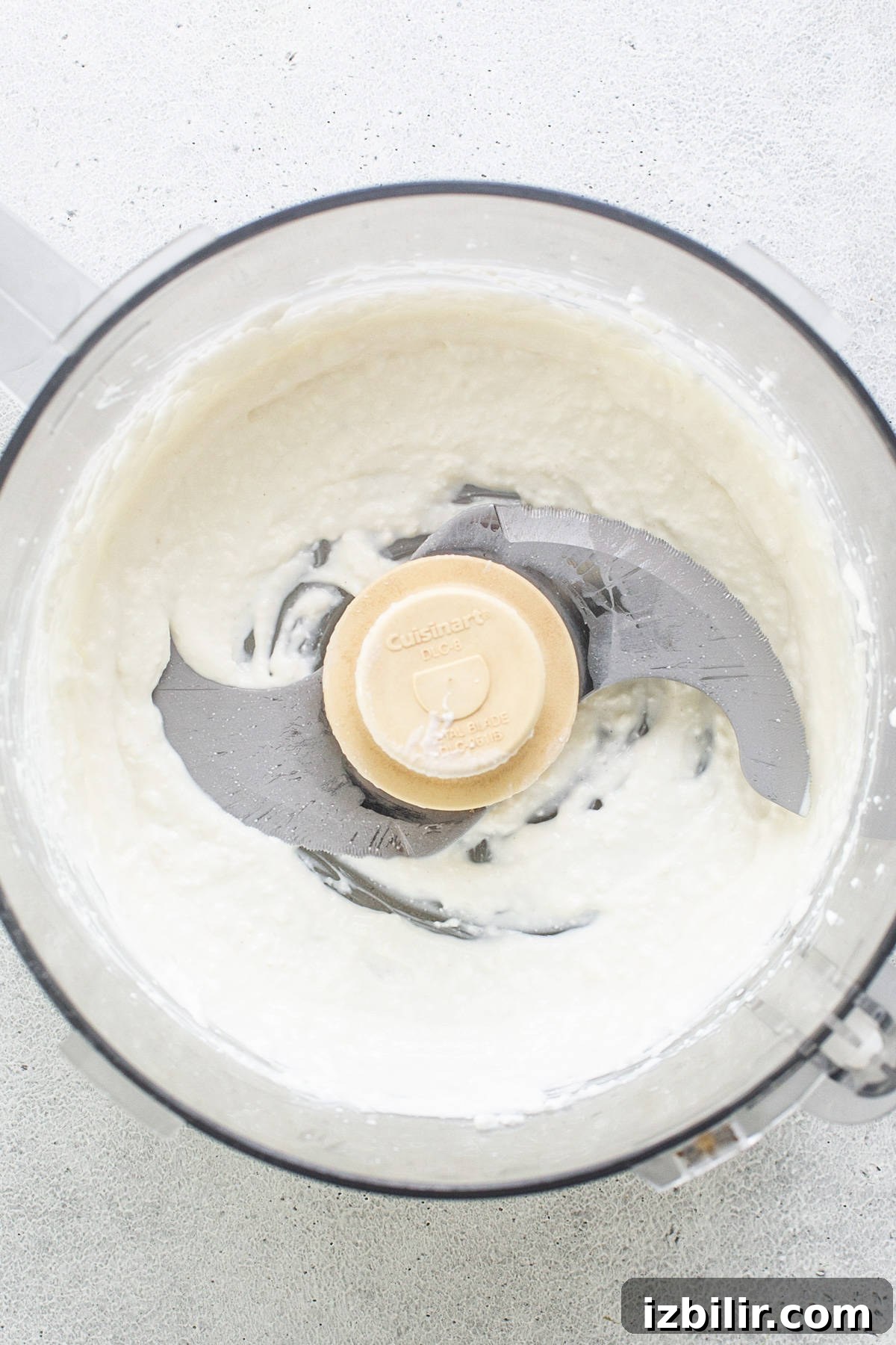 Whipped cream in a food processor.