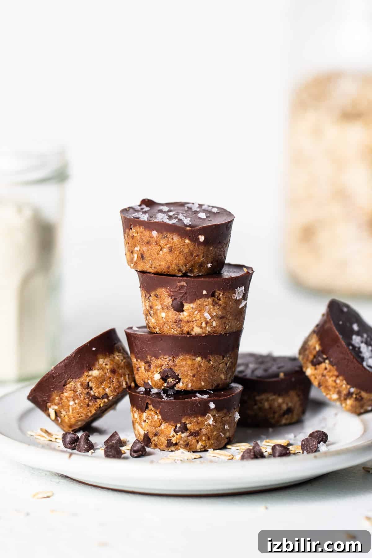 A stack of chocolate oatmeal cups on a plate.