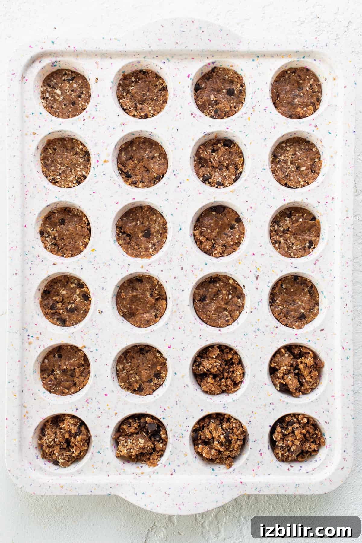 A tray filled with chocolate chip cookie dough.