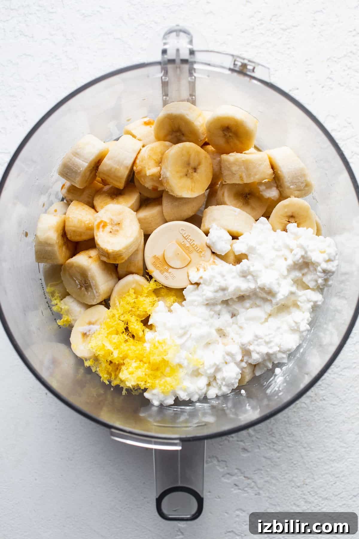 Lemon Cheesecake Nice Cream Recipe 5 A bowl with bananas and cottage cheese ready to blend.