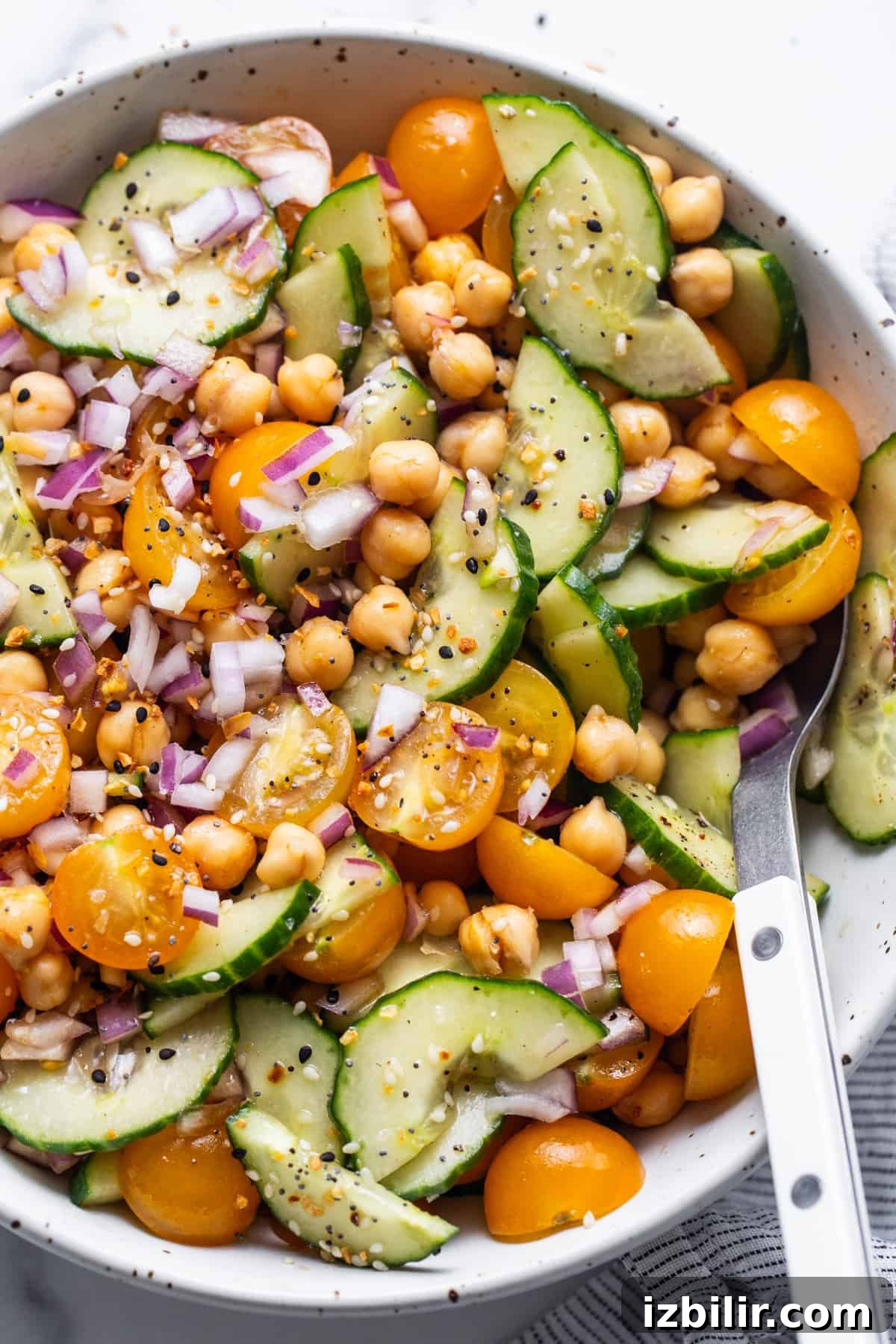 Chickpea and cucumber salad in a bowl.