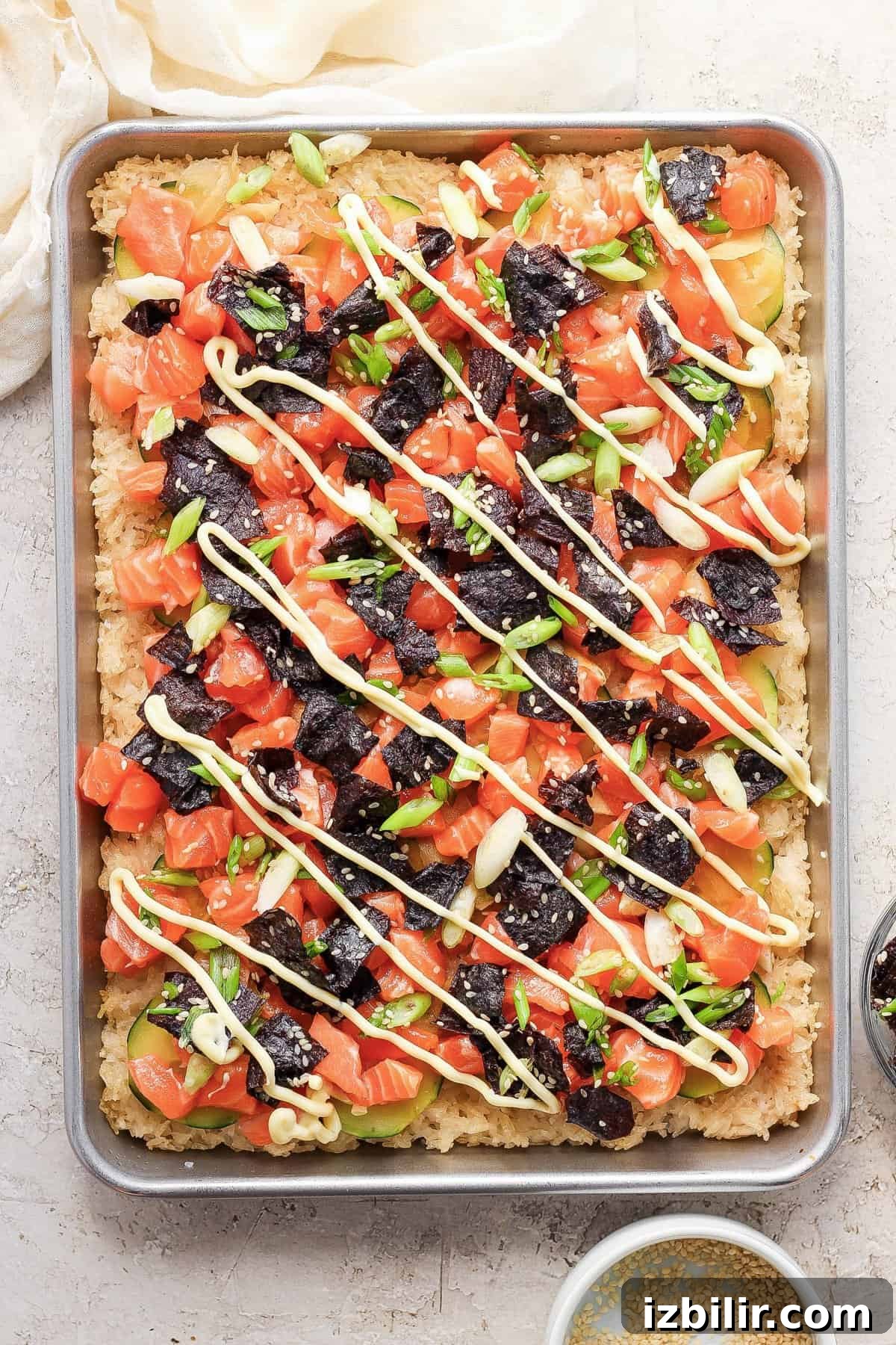 Sheet-Pan Salmon with Crispy Golden Rice 8 Crispy rice sheet with salmon and garnishes