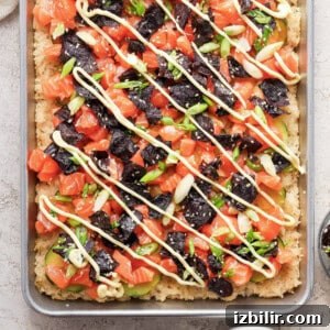 Sheet-Pan Salmon with Crispy Golden Rice 9 Final crispy rice and salmon on a baking sheet