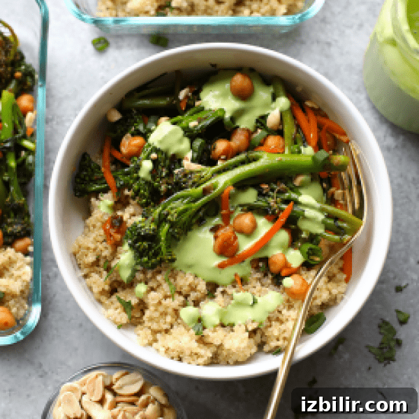 Spicy Kung Pao Quinoa Bowls with Crispy Tofu and Peanuts 6 A bowl of quinoa, broccoli and greens with a green dressing.