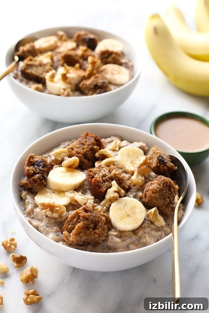 Our fluffy banana stovetop oatmeal is a morning favorite! It's made with rolled oats, mashed banana, chia seeds, and a little bit of maple syrup. banana stovetop oatmeal with sliced banana