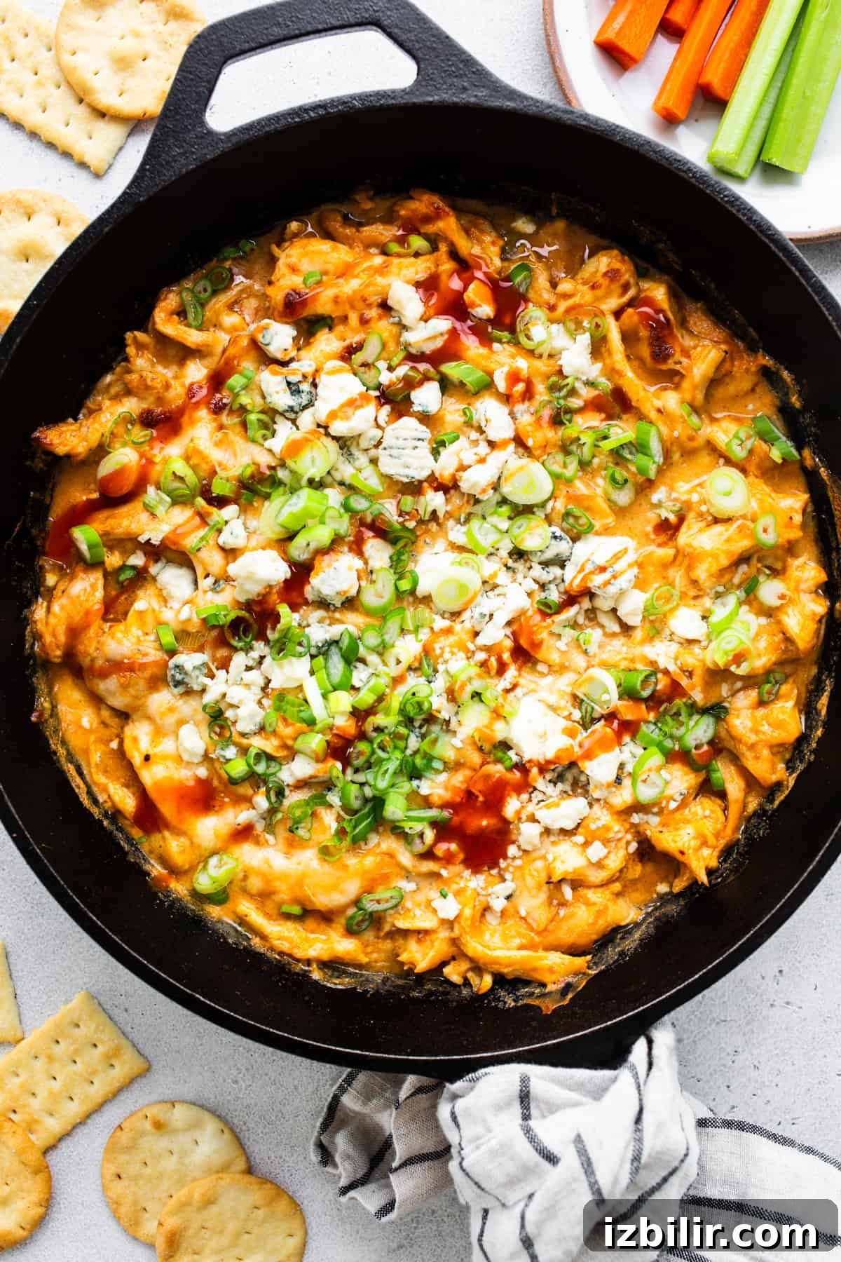 Buffalo Chicken Dip with Whipped Cottage Cheese Recipe 7 Buffalo chicken dip in a skillet with crackers.