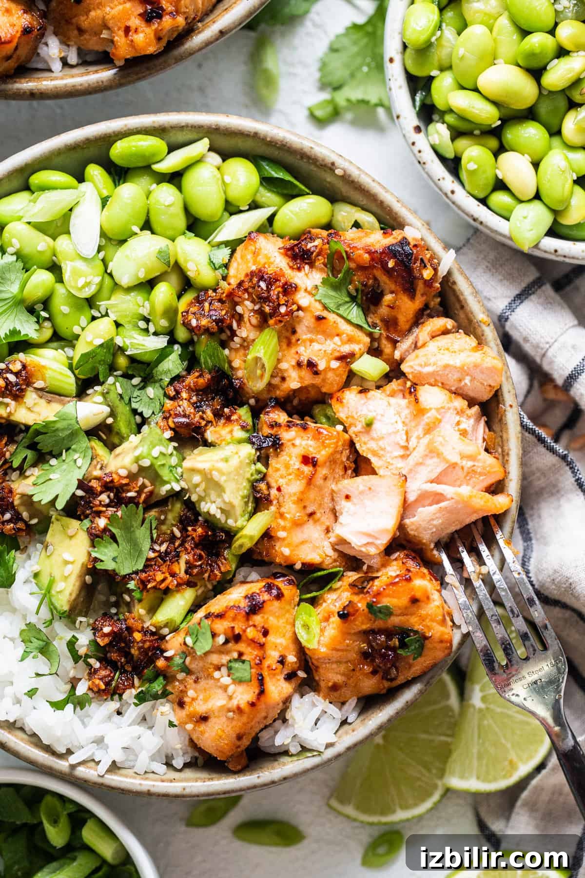 Fit Foodie Cooking Club: Feb 2024 Recipes & Events 7 a bowl filled with chicken, peas, and rice.